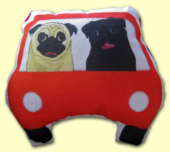 Black & Fawn Pugs in their Red Car