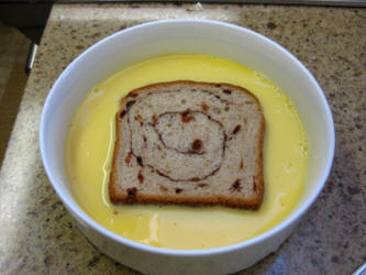 Dunk your bread slices on both sides.