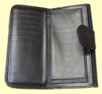 Inside large wallet showing pockets and checkbook cover.